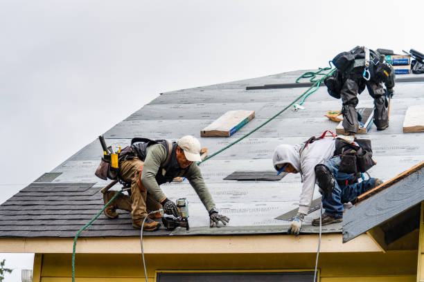 Professional Emergency Roof Repair technician working in Harrison, NY
